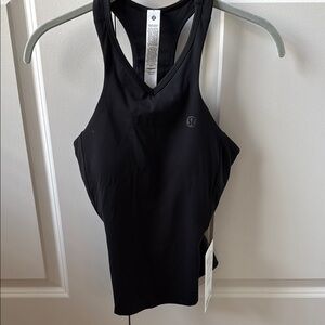 Waist length V neck tennis tank